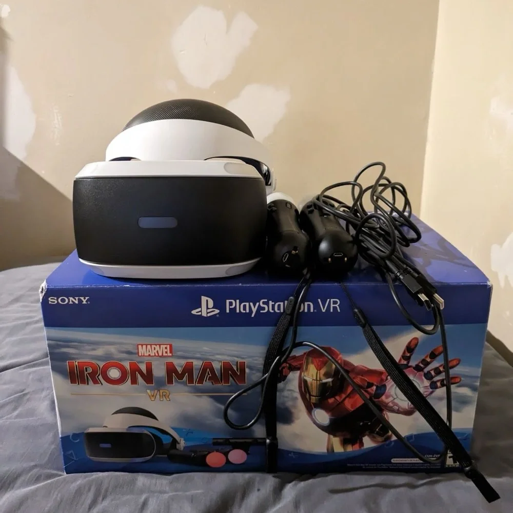 hardly used VR with the two controllers and all the cords with Spider-Man VR